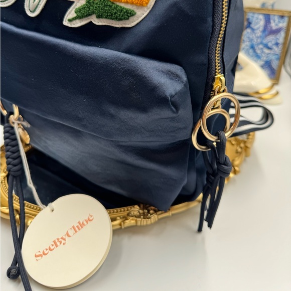 🆕 SEE BY CHLOE 🧿 NWT Blue Satin Palm Trees Decal Backpack - Picture 4 of 16